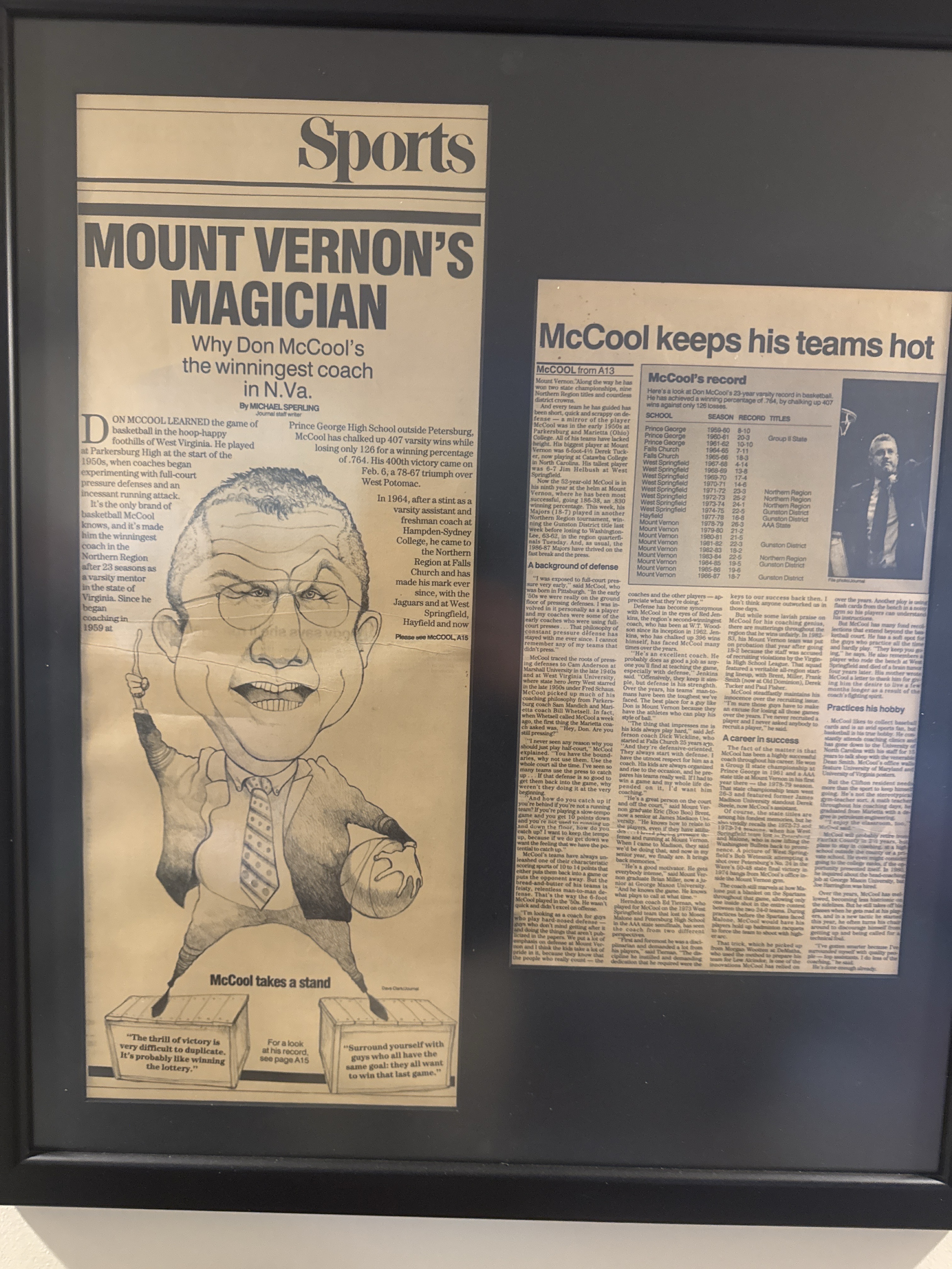 The two newspaper clippings mounted and framed together.